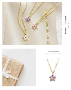 Detail view of flower pendant necklaces with sparkling zircons in purple pink and white
