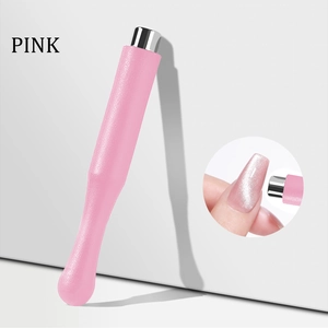 Pink magnetic wand for cat eye nail polish with silver metal tip and textured handle