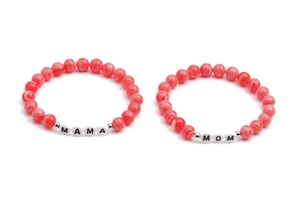 Detailed view of red textured beaded MAMA and MOM bracelets for Mother's Day gift