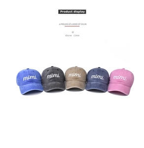 Detailed display of vintage washed baseball caps in five colors with mimi embroidery