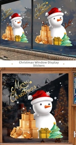 Detail of Christmas snowman static stickers on glass windows with festive holiday patterns