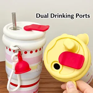 Dual-drinking coffee mug with ceramic liner and cute puppy graphic on wooden desk