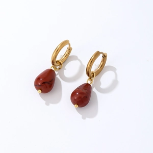 Detail of teardrop red jasper stone earrings with minimalist gold hoops for women