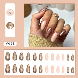 Almond-shaped almond nude and gold glitter press-on nails with small rhinestones W393