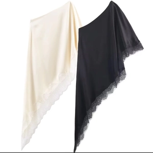 Women's asymmetrical satin top with delicate eyelash lace trim in black and beige colors