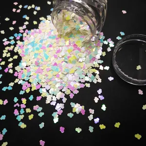 Cloud-shaped iridescent glitter flakes in pastel colors for nail art and DIY projects