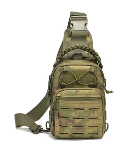 Tactical chest bag detail featuring laser-cut webbing and woven paracord handle