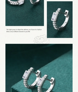 Detail showing S925 hallmark on silver earrings with micro-inlaid zircon stones