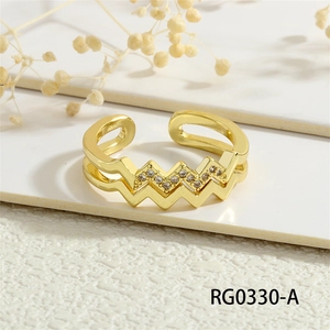 Macro shot of double-layer wavy gold ring with micro-paved zircons and adjustable band
