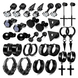 Detail shot of black stainless steel earring set with cross and geometric designs