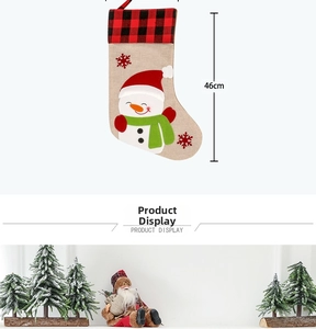 Detail of 46cm burlap Christmas stocking with snowman embroidery and red plaid cuff