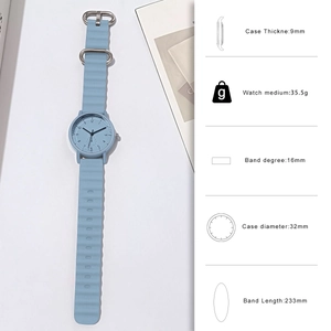 Detail of light blue quartz watch with wavy silicone strap and core dimension icons