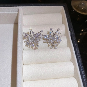 French irregular zirconia pearl firework stud earrings in silver minimalist design