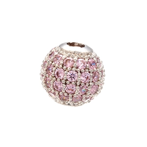 Macro shot of a silver spherical bead pavé-set with sparkling pink cubic zirconia stones
