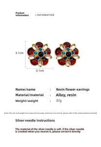 Detail view of vintage style resin flower earrings with size dimensions and silver pins