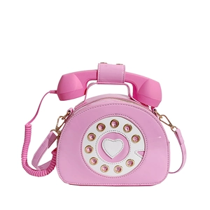 Borsa a tracolla creativa rosa a forma di telefono retrò con dettaglio a cuore