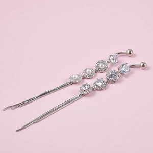 Elegant stainless steel belly button ring with white pearls and long tassel fringe