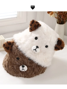 Close-up of plush bear bucket hats with fuzzy texture and leopard print ears details