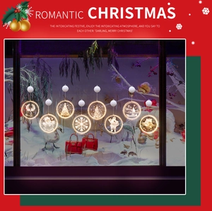 Macro view of round warm LED Christmas hanging lights with white festive patterns
