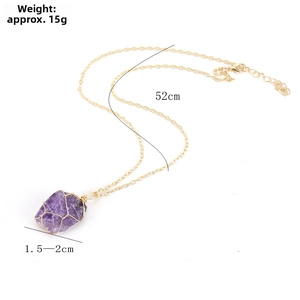 Detailed view of handmade gold wire-wrapped raw purple amethyst stone pendant on a chain