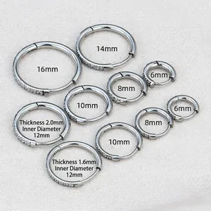 Silver stainless steel huggie earrings with cubic zirconia in various sizes and widths