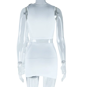 Rear view of white bodycon two-piece set featuring a cropped vest top and a mini skirt