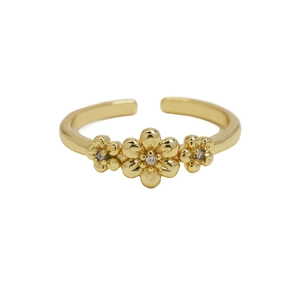 Polished 18k gold daisy flower ring with sparkling crystals in an open adjustable band