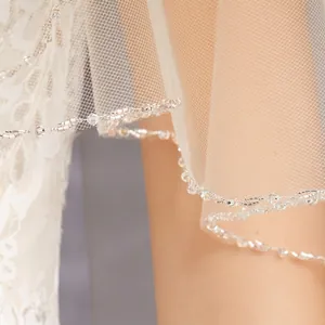 Elegant wave design bridal veil with handmade beadwork and crystal pearl details
