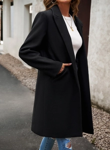 Side view of elegant black long coat with notch lapel and classic commuter style