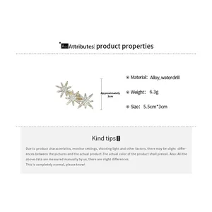 Detailed view of sparkling star-shaped hair clip with dimensions 5.5cm by 3cm