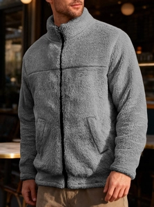 Close-up of grey polar fleece jacket with stand collar and zipper closure detail