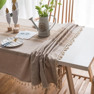 Waterproof linen-style tablecloth with elegant white stripes and tassel edge decoration
