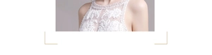 Détail du décolleté de mariage blanc avec broderie florale et perles fantaisie