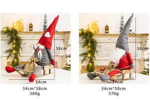 Detailed view of 58cm Christmas gnome dolls on wooden sleds with size and weight info