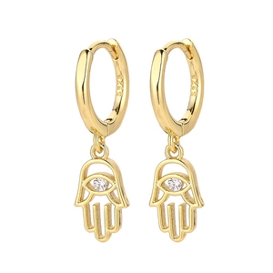 Detailed macro view of S925 sterling silver stamp on golden Hamsa Hand charm earrings