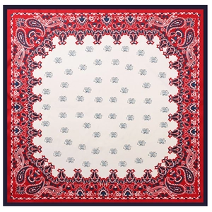 Detailed top view of a red and white paisley print square silk scarf with floral patterns