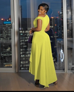 Detail of yellow off-shoulder dress featuring an asymmetrical high-low hemline and waist cut