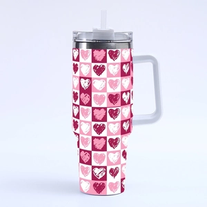 Detailed view of 40oz heart pattern tumbler with handle, transparent lid and straw