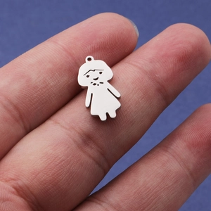 Polished silver stainless steel cartoon girl pendant shown for size reference