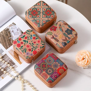 Portable vintage cork travel jewelry box with square zip and bohemian floral patterns
