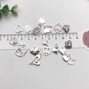 Vintage silver heart charms with Love and Thank You engravings for DIY jewelry making