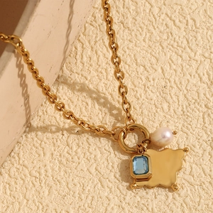 18K gold plated stainless steel necklace with blue stone and pearl geometric pendant