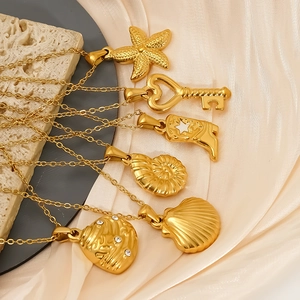 Gold plated stainless steel necklaces featuring seashell starfish and heart charms