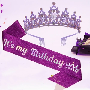 Detail of purple glitter birthday sash with holographic silver text and jeweled tiara