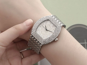Elegant tonneau-shaped women's quartz watch with full rhinestone inlay and Roman numerals
