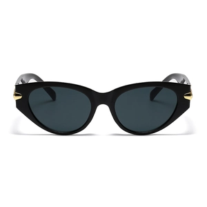Vintage cat-eye sunglasses with black frames and golden tapered metal hardware accents
