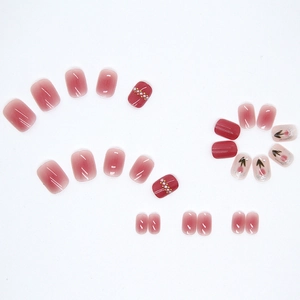 Pink gradient press-on nails with tulip art and pearls in a complete 24pc set