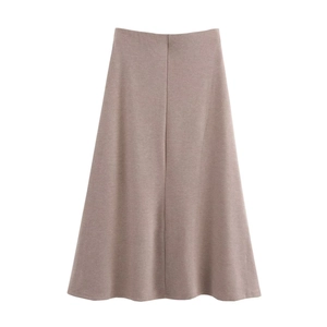 Detailed view of dark brown knitted midi skirt featuring a fine vertical ribbed texture