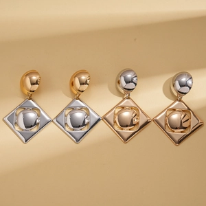 Exaggerated geometric square and round metal earrings in gold and silver mixed tones