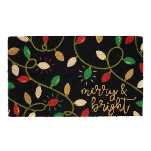 Detail of coconut fiber doormat with festive Christmas lights and merry and bright text
